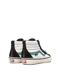 Baskets montantes en toile noires et blanches Vans