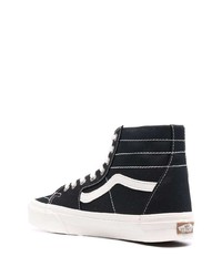 Baskets montantes en toile noires et blanches Vans