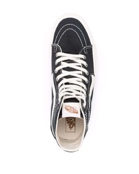 Baskets montantes en toile noires et blanches Vans