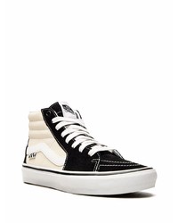 Baskets montantes en toile noires et blanches Vans