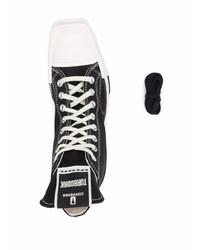 Baskets montantes en toile noires et blanches Converse