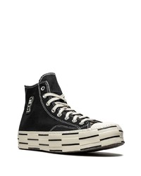 Baskets montantes en toile noires et blanches Converse