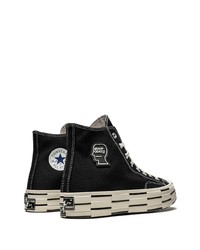 Baskets montantes en toile noires et blanches Converse