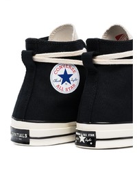 Baskets montantes en toile noires et blanches Converse