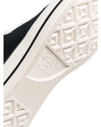 Baskets montantes en toile noires et blanches Converse