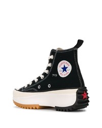 Baskets montantes en toile noires et blanches Converse