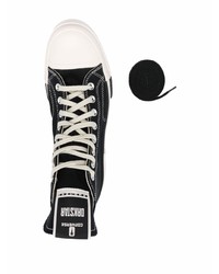 Baskets montantes en toile noires et blanches Converse