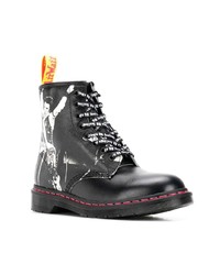 Bottes de loisirs en cuir noires et blanches Dr. Martens