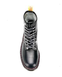 Bottes de loisirs en cuir noires et blanches Dr. Martens