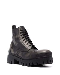 Bottes de travail en cuir noires Balenciaga