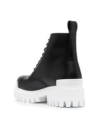 Bottes de travail en cuir noires Balenciaga