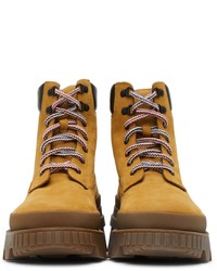 Bottes de travail en daim tabac Moncler