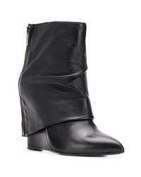 Bottes mi-mollet en cuir noires The Seller