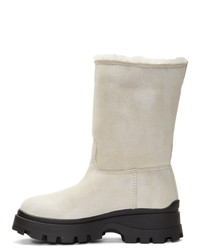 Bottes mi-mollet en daim blanches Miu Miu