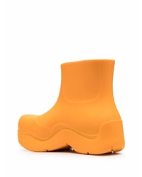 Bottines chelsea en caoutchouc orange Bottega Veneta