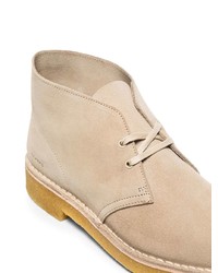 Bottines chukka en daim beiges Clarks Originals