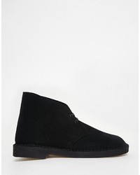 Bottines chukka en daim noires Clarks