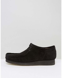 Bottines chukka en daim noires Clarks