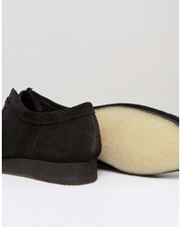 Bottines chukka en daim noires Clarks