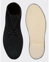 Bottines chukka en daim noires Clarks