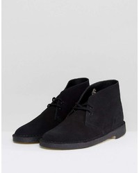 Bottines chukka en daim noires Clarks