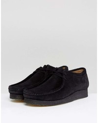 Bottines chukka en daim noires Clarks