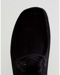 Bottines chukka en daim noires Clarks