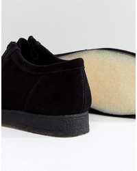 Bottines chukka en daim noires Clarks