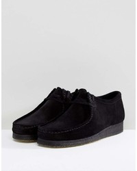 Bottines chukka en daim noires Clarks