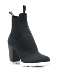 Bottines en cuir noires et blanches Prada