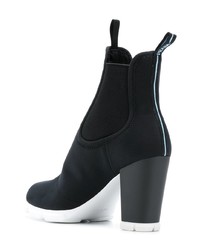 Bottines en cuir noires et blanches Prada