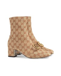 Bottines en toile imprimées marron clair Gucci