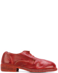 Chaussures à lacet en cuir rouges