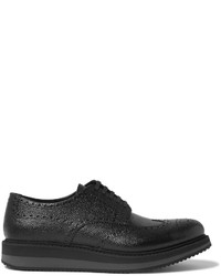 Chaussures brogues en cuir bordeaux Prada