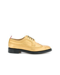 Chaussures brogues en cuir dorées