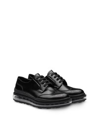 Chaussures brogues en cuir épaisses noires Prada