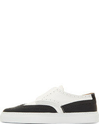 Chaussures brogues en cuir noires et blanches Givenchy