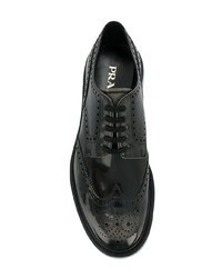 Chaussures brogues en cuir noires Prada