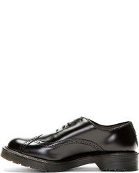 Chaussures brogues en cuir noires Dr. Martens