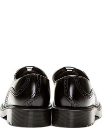 Chaussures brogues en cuir noires Dr. Martens