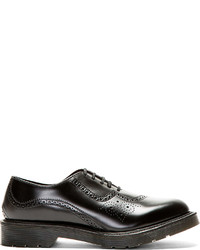 Chaussures brogues en cuir noires Dr. Martens