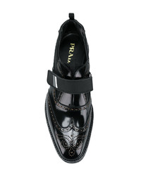 Chaussures brogues en cuir noires Prada