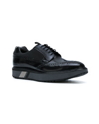 Chaussures brogues en cuir noires Prada