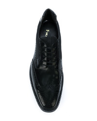 Chaussures brogues en cuir noires Prada