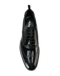 Chaussures brogues en cuir noires Prada