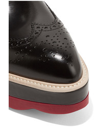 Chaussures brogues en cuir noires Prada