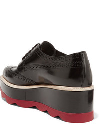 Chaussures brogues en cuir noires Prada