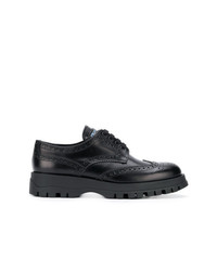 Chaussures brogues en cuir noires Prada