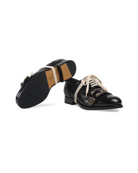 Chaussures brogues en cuir noires Gucci