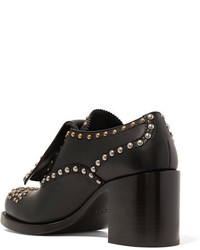 Chaussures brogues en cuir noires Prada